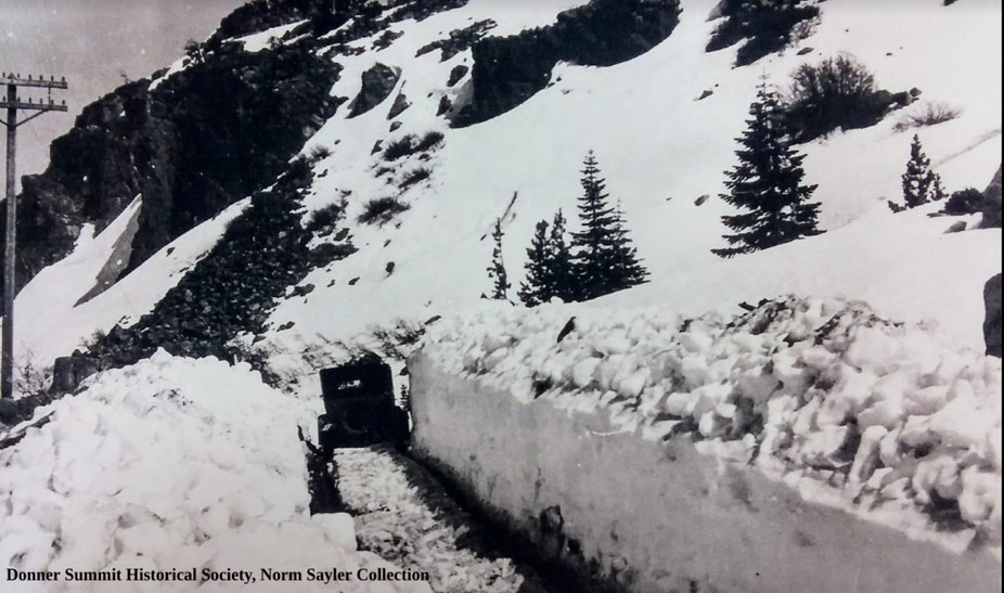 Driving down Donner Pass, snow cleared by hand